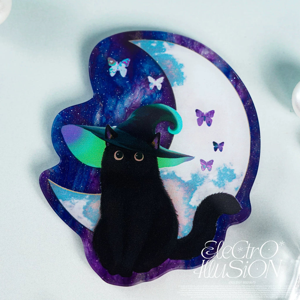Black cat with black witch hat on a colorful crescent moon background with butterflies, brand 'Electro Illusion' visible.