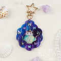 Decorative keychain with a cat design on a white background