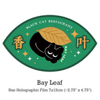 Holographic film with a black cat and bay leaf design, featuring 'Black Cat Restaurant' text.