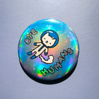 Holographic button with a cat design and text 'BYE HUMANS' on a gray background