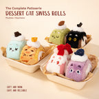 Collection of cat-themed dessert plushies and keychains on a beige background with text 'The Complete Patisserie Dessert Cat Swiss Rolls'.