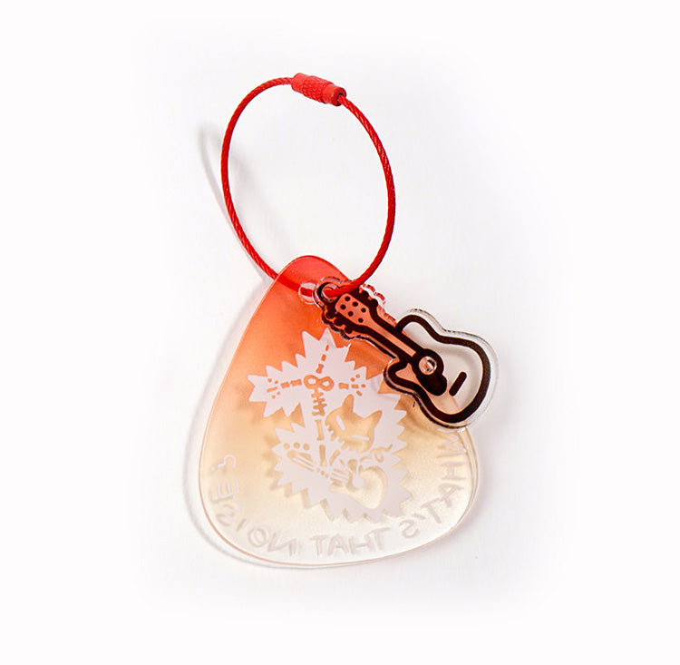 Clear plastic keychain with guitar design on a white background