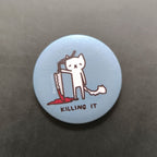 Button badge with a cat illustration and 'Killing It' text on a light blue background