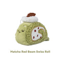 Plush toy resembling a matcha red bean Swiss roll on a white background