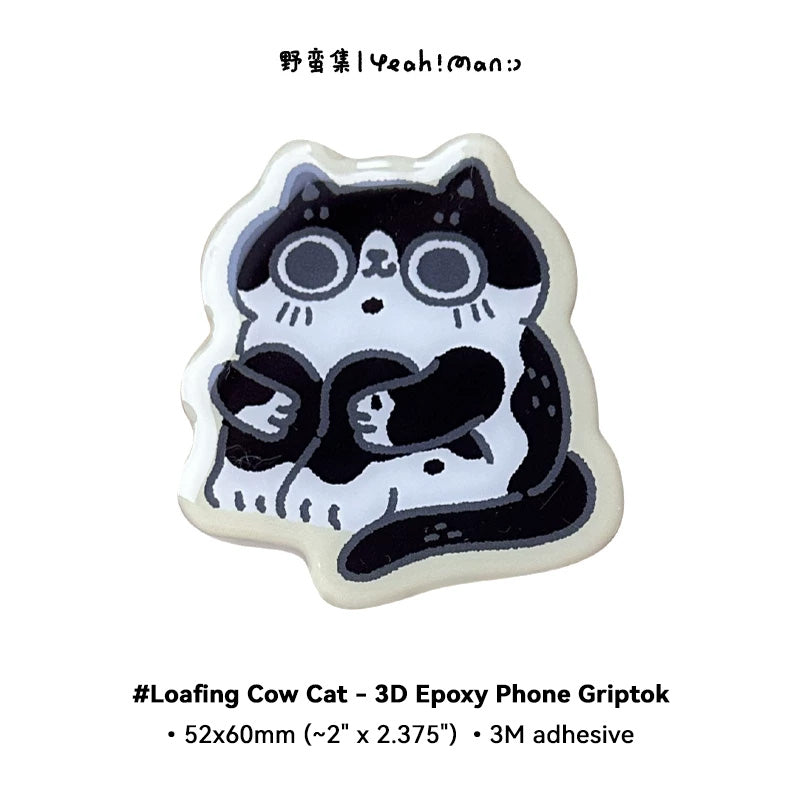 3D epoxy phone grip with a cow cat design on a white background