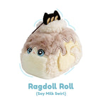 Plush toy resembling a ragdoll cat as a Swiss roll on a white background