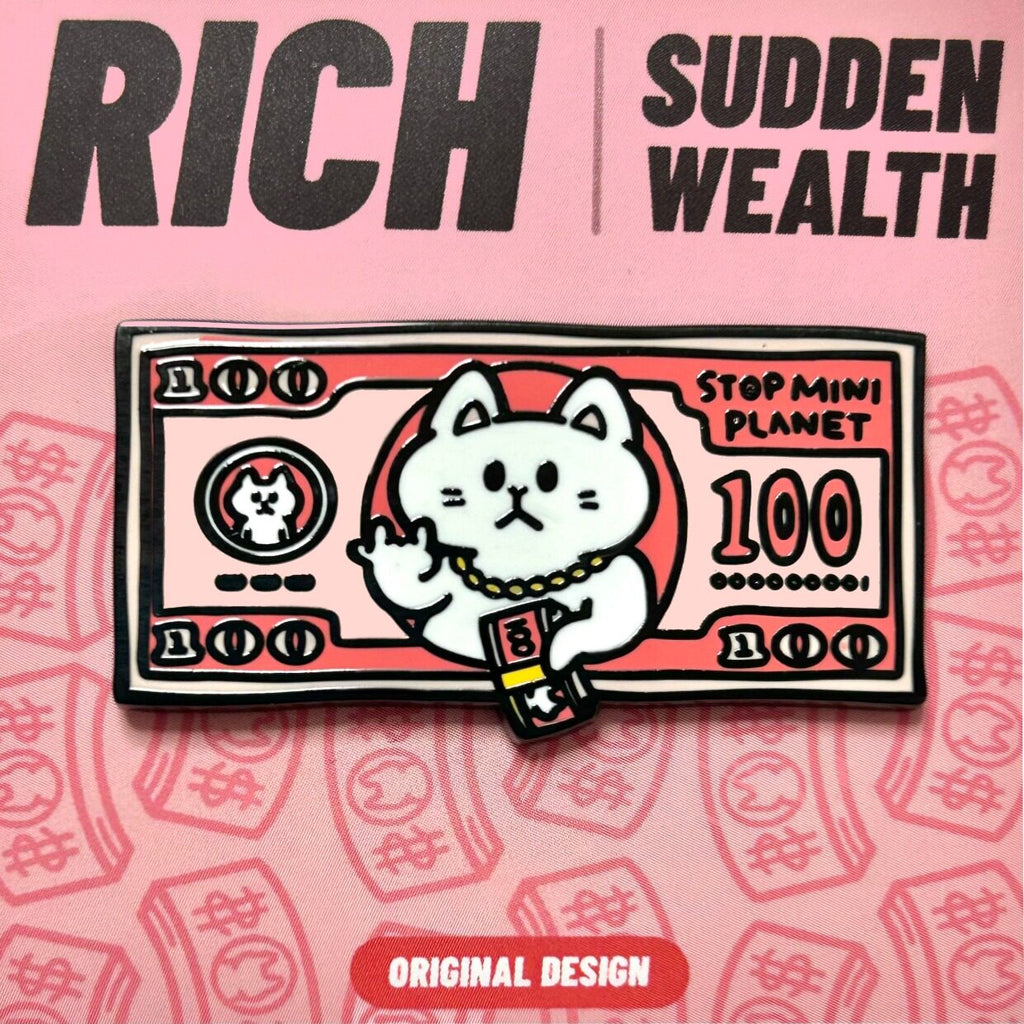 Enamel pin of a cat holding money with 'Rich Sudden Wealth' text on a pink background